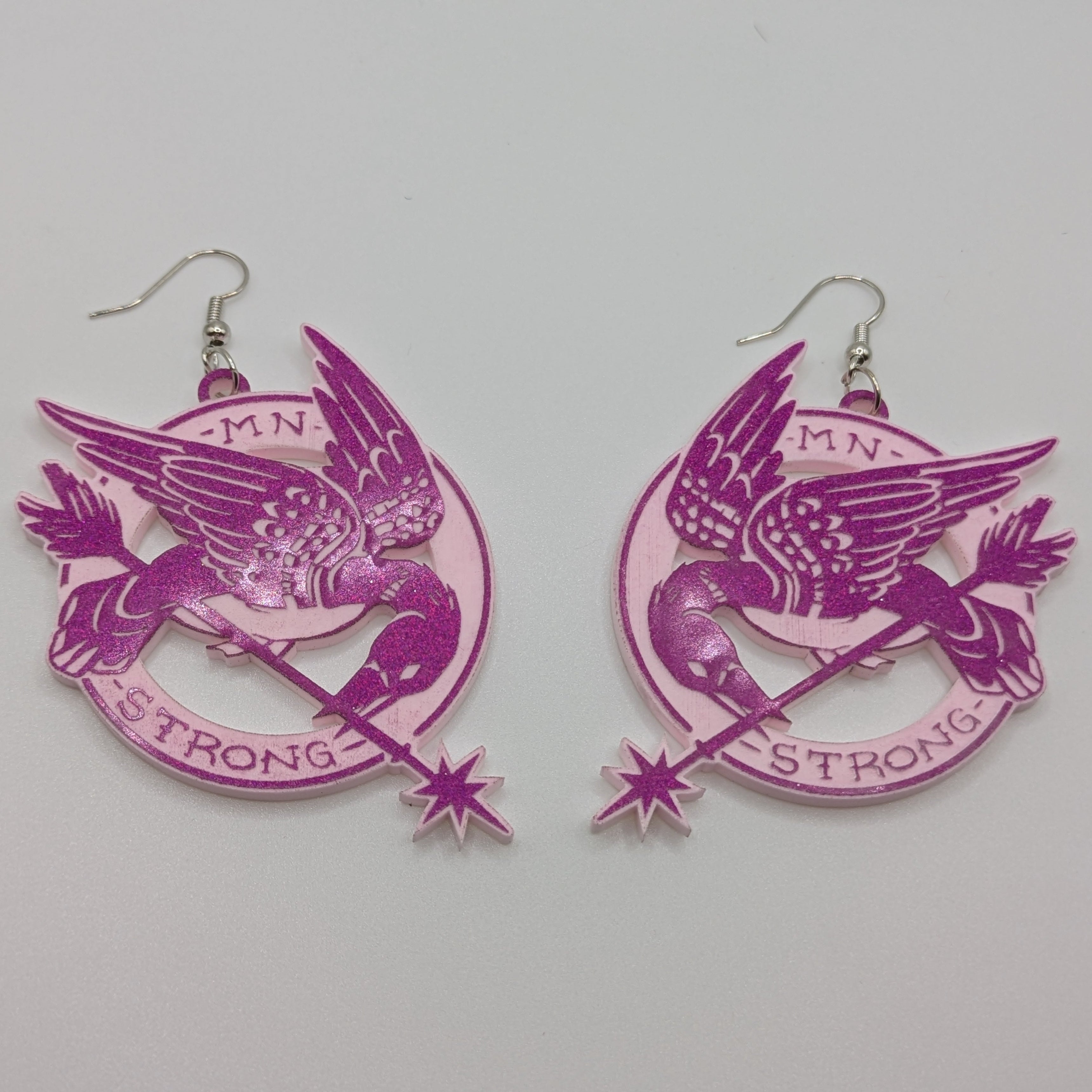North Star Rebellion's Mockingloon Earrings and Pins  - Smitten Kitten Variant