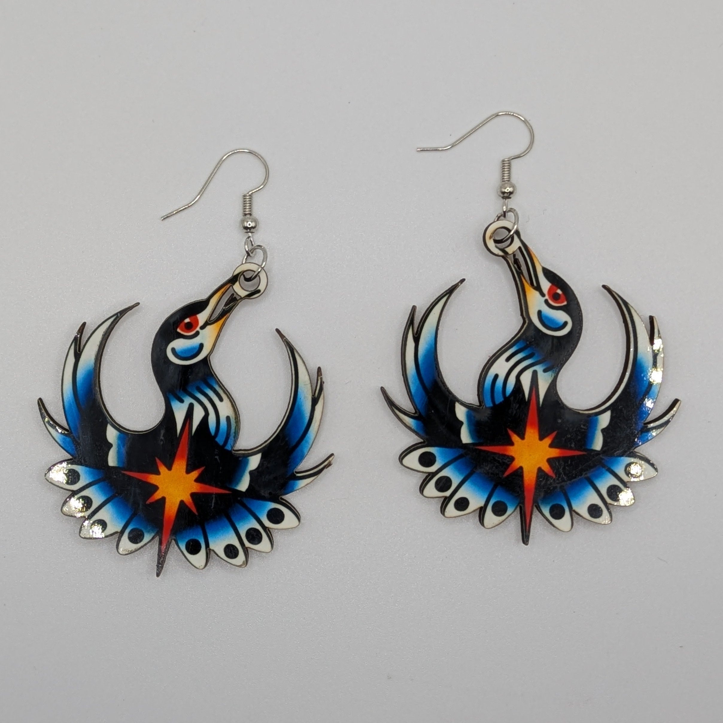 Andrea Bartsch's Rebel Loon Earrings and Pins