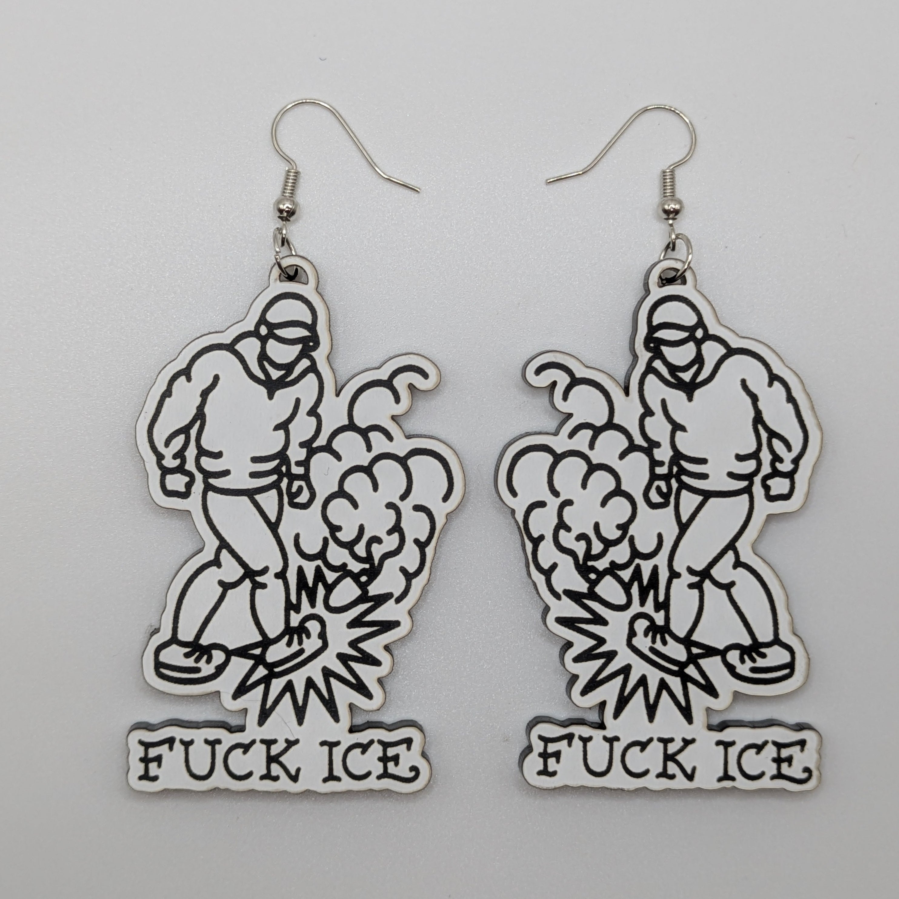 Andrea Bartsch's Creative Resistance Fuck ICE Earrings and Pins
